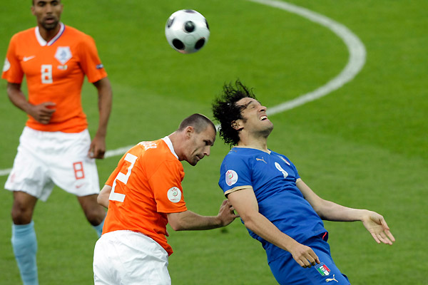 luca toni of italy and andre ooijer of holland