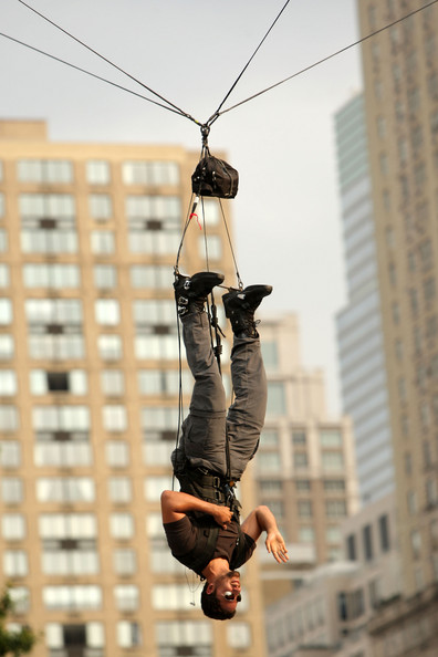 David Blaine hangs upside down at Central Park in New York