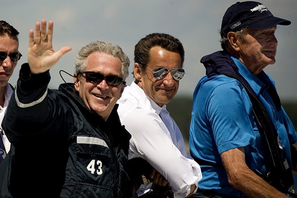 george_w_bush_with_his_dad_and_nicolas_sarkozy_boat_trip_august2007.jpg