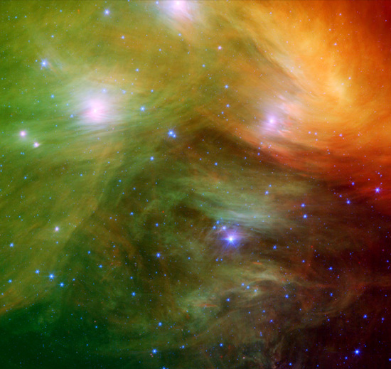 Инфракрасное изображение облаков пыли, окружающей  звезды группы Семь Сестер, также известных как Плеяды