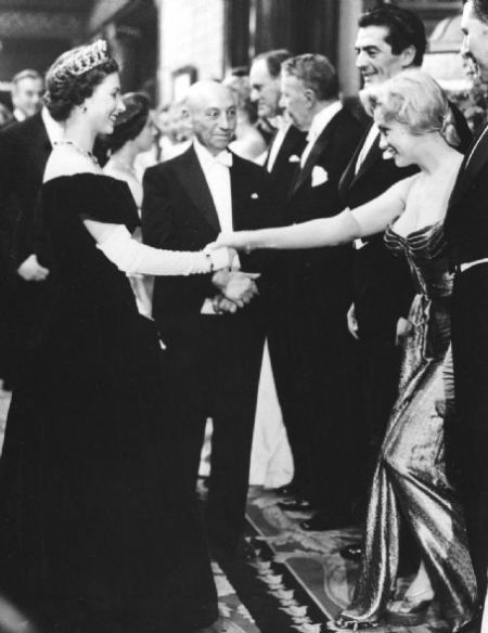 Marilyn Monroe meets Queen Elizabeth II, London, 1956.jpg